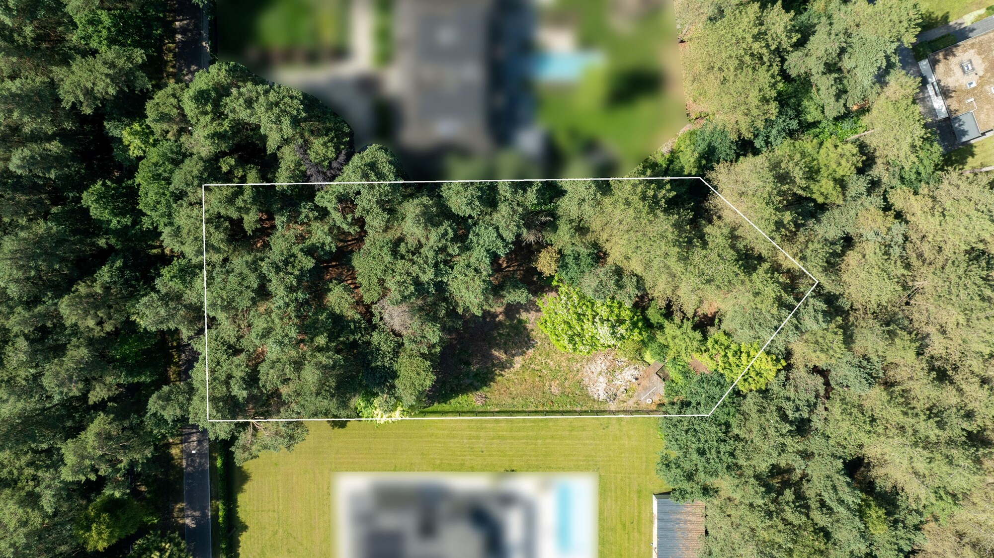 Bouwgrond in een bosrijke omgeving met een oppervlakte van 3.261 m² te Pelt