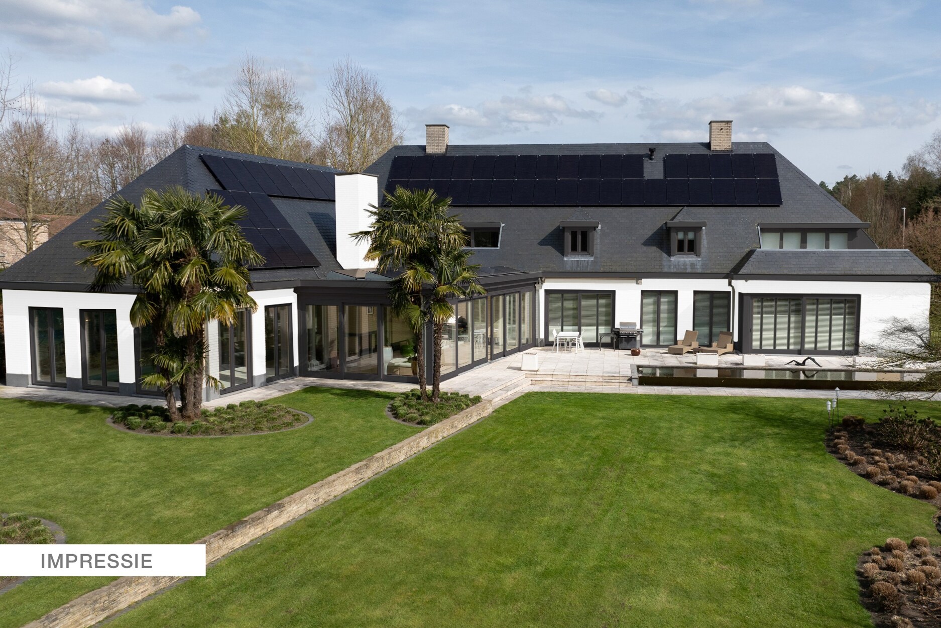 Exclusieve villa met binnenzwembad en 4 slpks op perceel van 2.491m² te Pelt (Grote Heide)