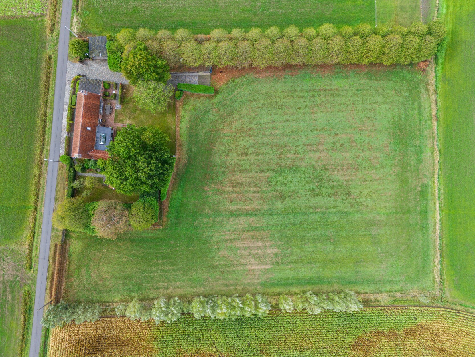 Charmante heropgebouwde hoeve op perceel van ca. 10.615 m² te Wuustwezel!