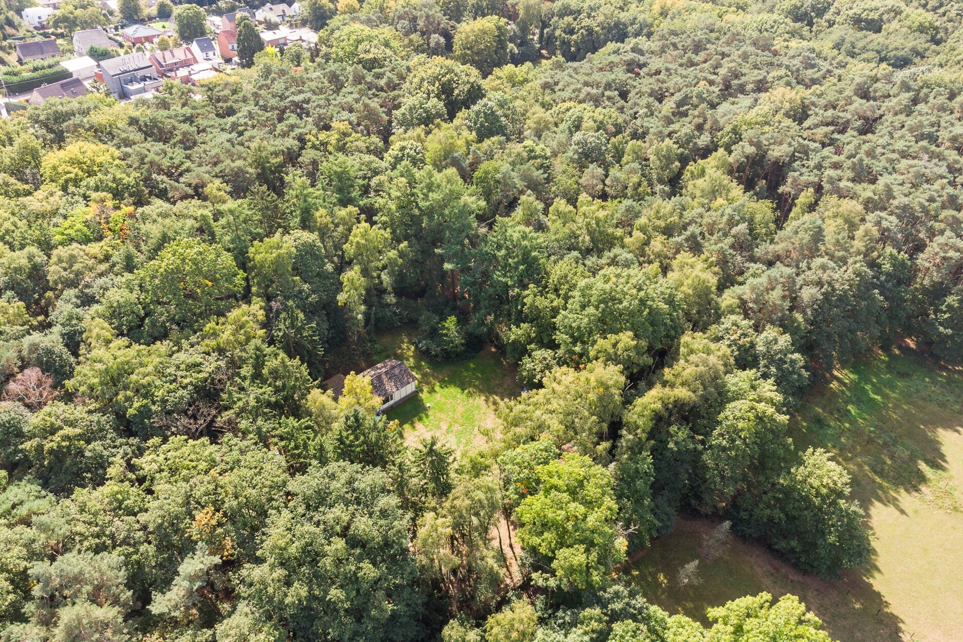 Exclusief gelegen bouwgrond voor een te bouwen woning van 1000m3 op een terrein van 11376m² te Lummen.