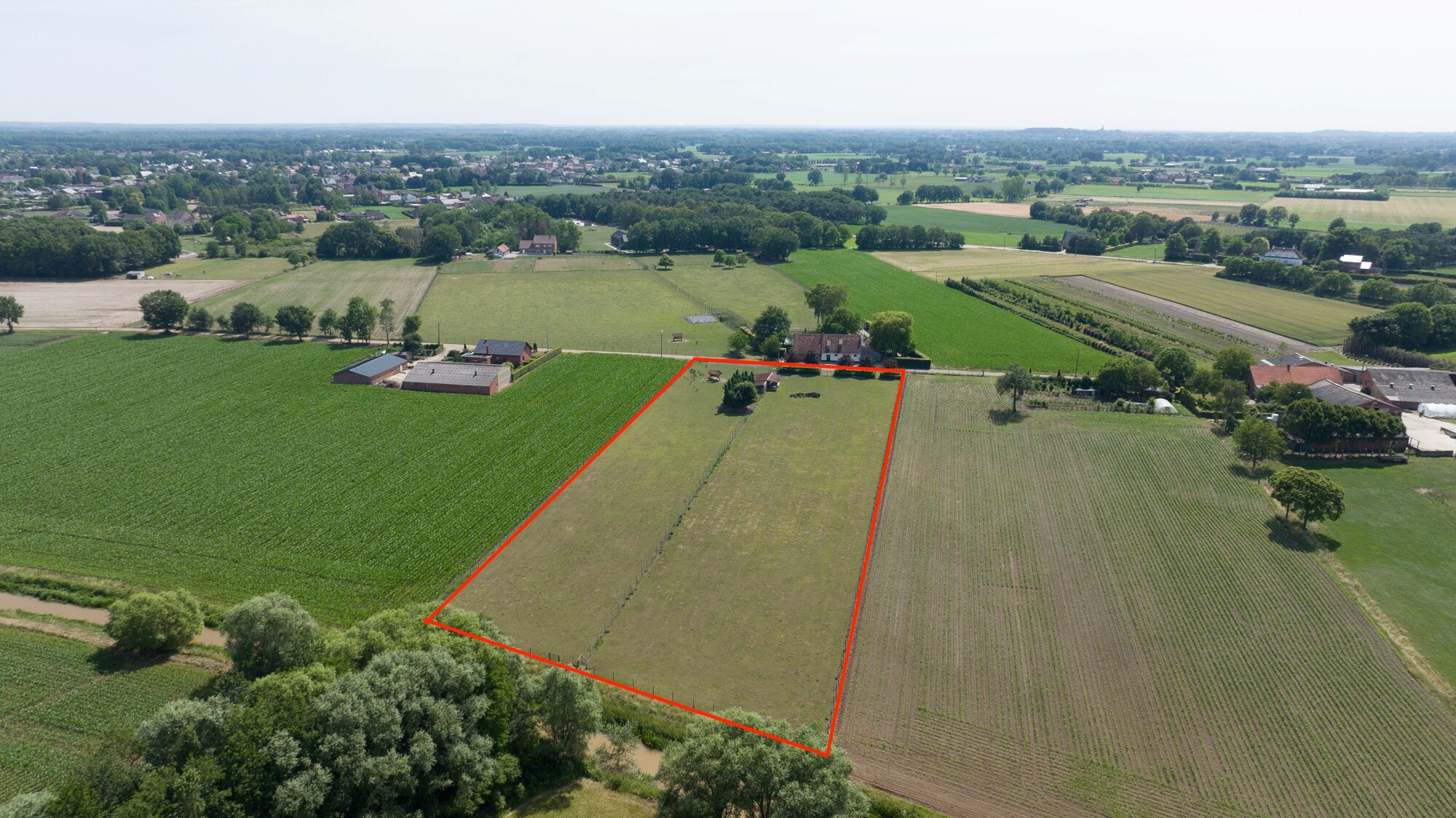 Landbouwgrond / Weide te koop – 12.000 m²