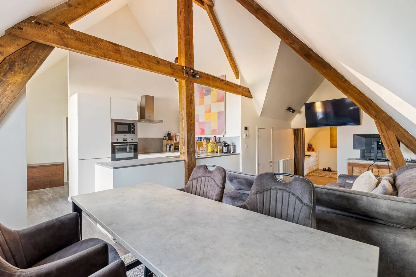 Recent en gunstig gelegen 1 slaapkamerappartement met terras, in het Oud-Gemeentehuis van Kumtich