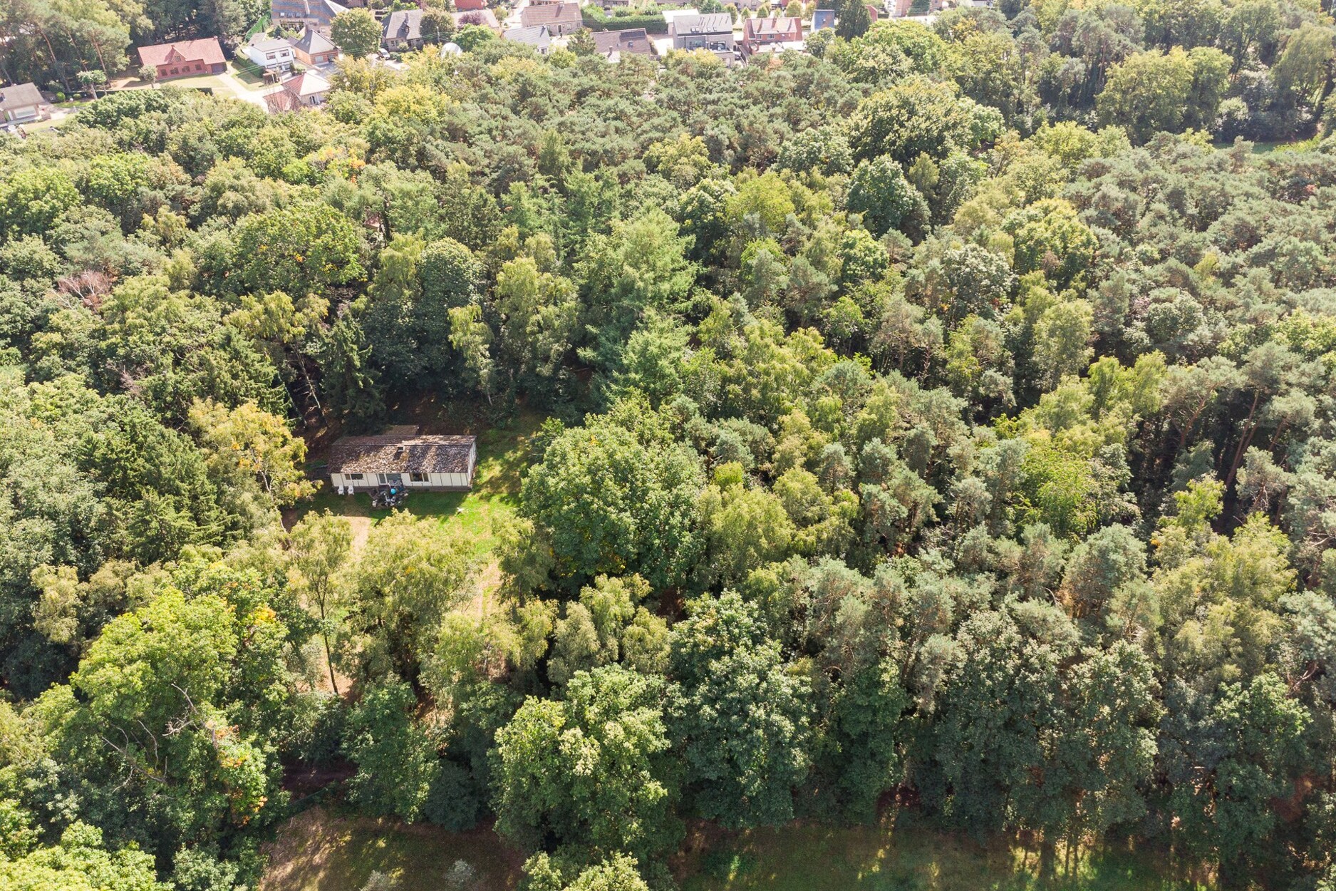 Exclusief gelegen bouwgrond voor een te bouwen woning van 1000m3 op een terrein van 11376m² te Lummen.