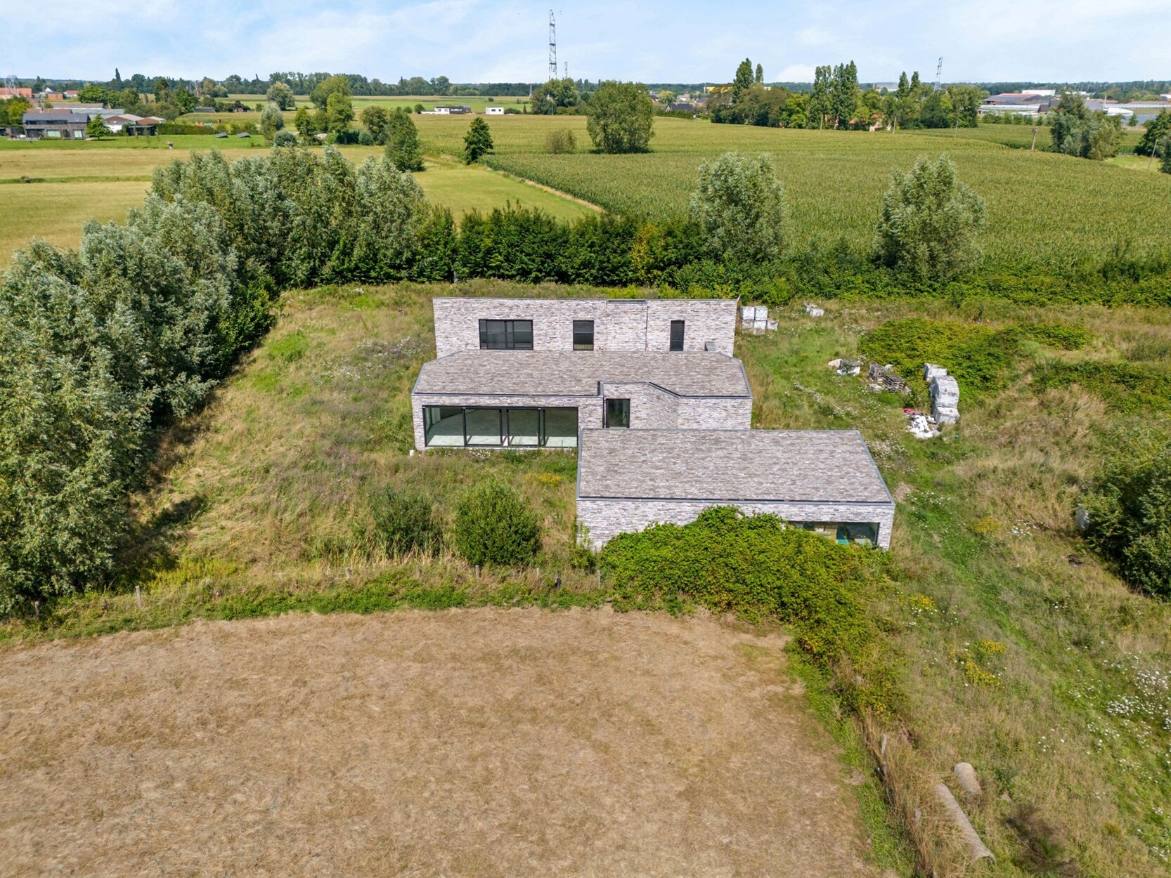 Unieke SEMI-CASCO DESIGN VILLA op 1,7 ha in Reet (Rumst) (vv.afwerkingsmaterialen)